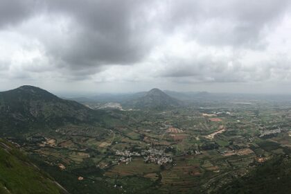 A panoramic shot of Nandi Hills captured during the rainy season.