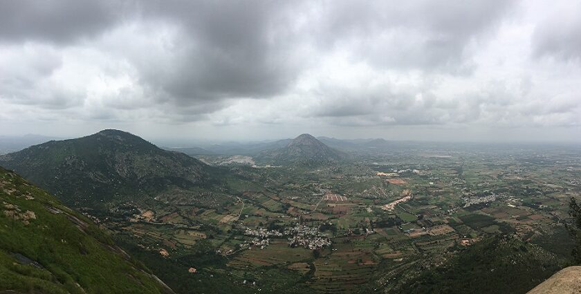 A panoramic shot of Nandi Hills captured during the rainy season.