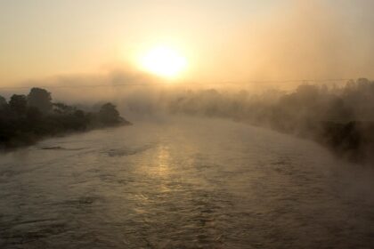 An image showing a stunning sunrise over Pune, capturing the city's skyline and nature.