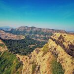 A Scenic view of Satara with rolling hills and lush greenery in Maharashtra, India.