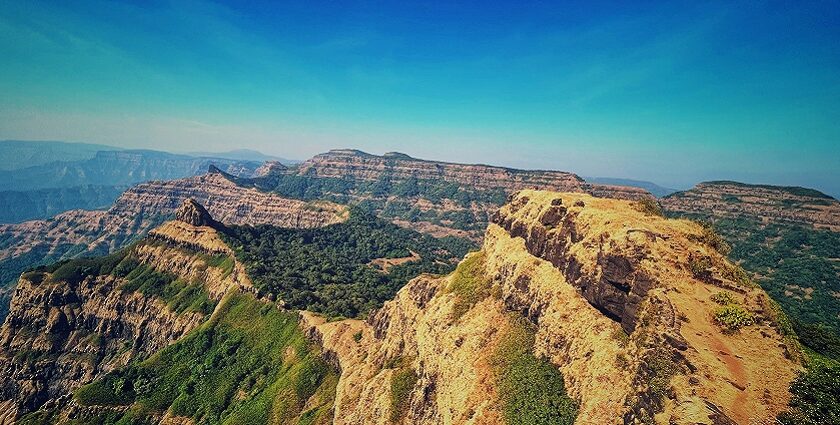 A Scenic view of Satara with rolling hills and lush greenery in Maharashtra, India.