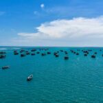 A view of rocky shores of Kanyakumari, an ideal place to visit near Rameshwaram.