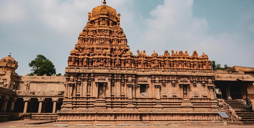 Picture of the sturdy, and very aesthetic Tanjore Temple along with its intricate details.