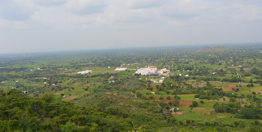 A picture of the scenic landscape of Dharmapuri showcasing lush hills and Hogenakkal Falls.