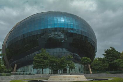 The round Infosys building features an innovative design promoting collaboration.