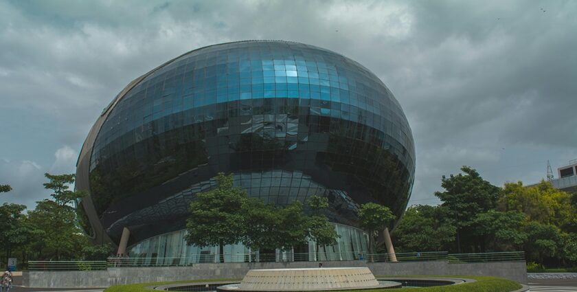 The round Infosys building features an innovative design promoting collaboration.