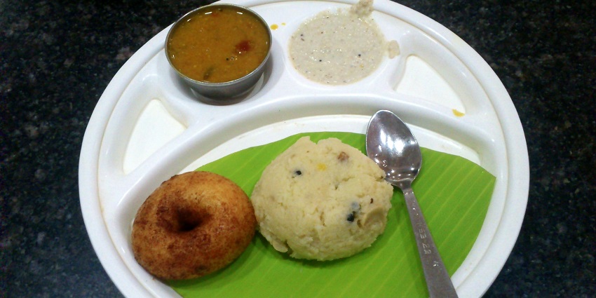 An image of Pongal which is a comforting South Indian dish made from rice and lentils.