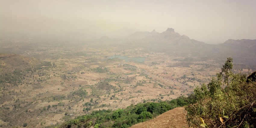 An image of Porcupine Point surrounded by lush hills, one of the best Matheran Trekking.