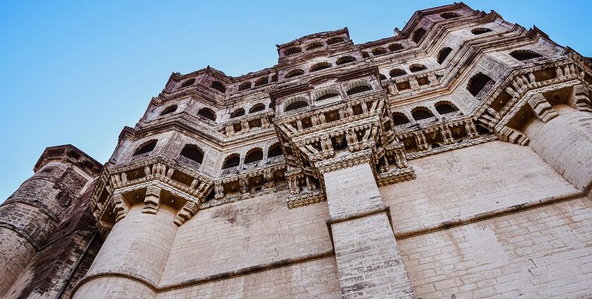 A stunning fortress towering on a rocky peak, evoking the grandeur of Prabalgad Fort.