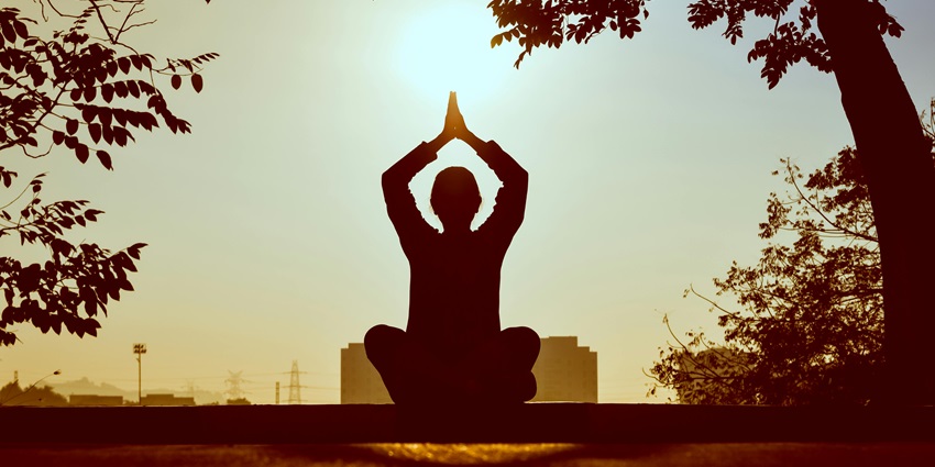 Practising spiritual activities including meditation sessions and singing experiences.