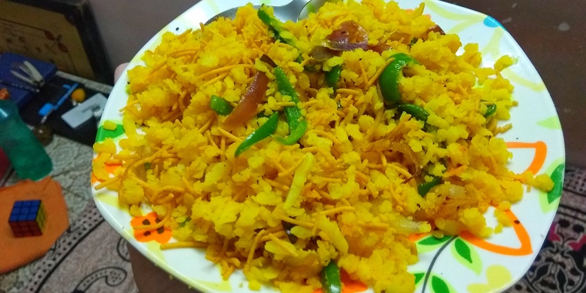 An image showing a plate of Poha, a traditional food item offered