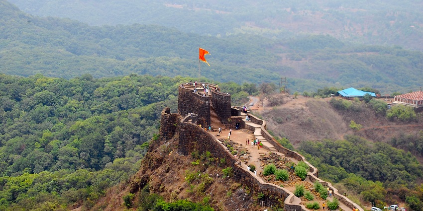 View of Pratapgad Fort in Maharashtra, India, perched atop a hill with rugged terrain