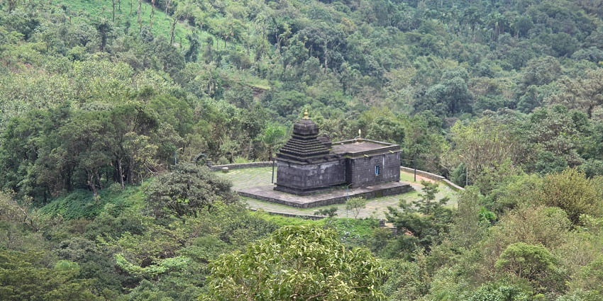 The historic Nelagahalli Temple located amidst lush greenery with a great architecture