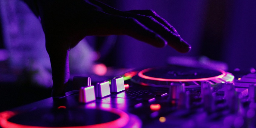 Highly energetic DJ arranged at a techno party in Hyderabad.