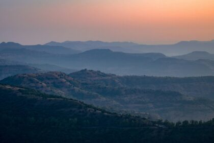 A glimpse of majestic mountains against a scenic backdrop in Maharashtra.