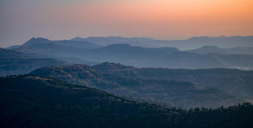 A glimpse of majestic mountains against a scenic backdrop in Maharashtra.