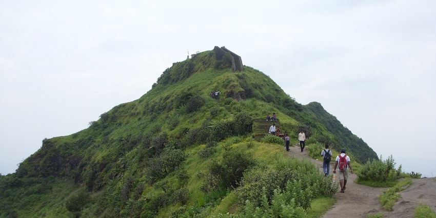 Purandar Fort offers stunning views and rich history, nestled in the lush Sahyadri range.