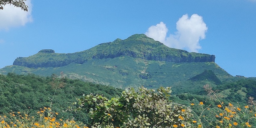 View of Purandar Fort, showcasing its historic architecture and surrounding landscape.