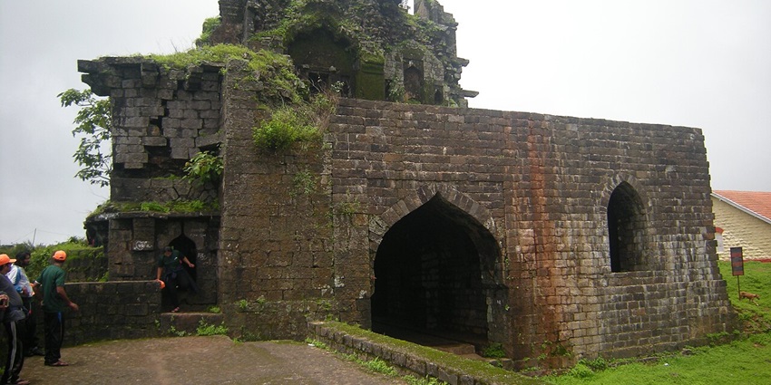 A historic watchtower within Panhala Fort offering panoramic views of Warna Valley and Sahyadri mountain ranges, one of the best places to visit in Panhala.