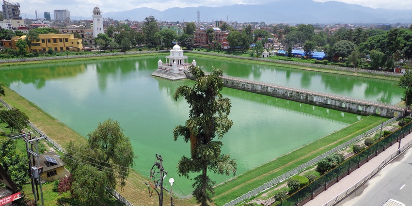 Queen’s Pond, the ancient stepped tank showcasing stunning water architecture.