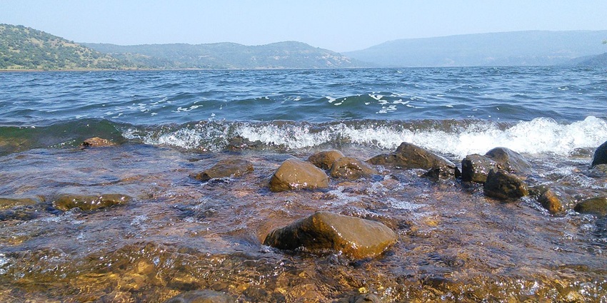 One of the places to visit in Kolhapur is the scenic Radhanagri Dam with lush green hills in the backdrop.