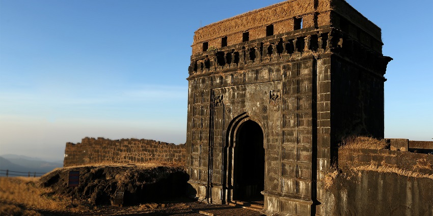 A low-angle view of the historic Raigad Fort, one of the top places to visit in Mulshi.