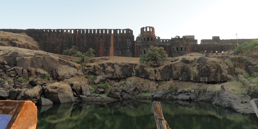 A view of the historic Raigad Fort, a famous place near Tamhini Waterfall, showcasing the ancient architecture