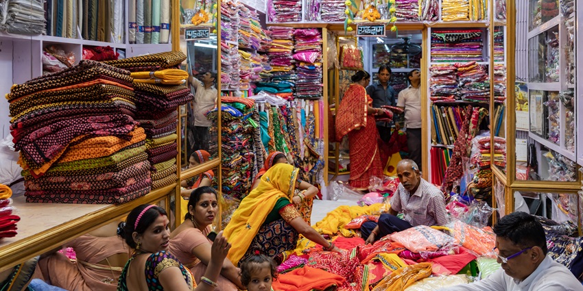 Customers having a great time while shopping in Kolhapur for local artefacts