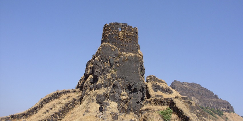 A panoramic view of Rajgad Fort, showcasing its ancient walls and surrounding hills