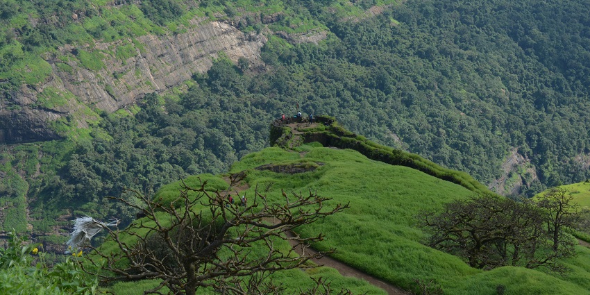 Panoramic view from Rajmachi showcasing the beauty of the surrounding hills and valleys.