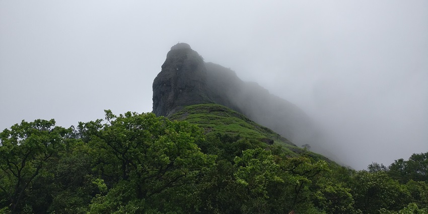 The ancient Rajmachi Fort is situated on top of the hill surrounded by rugged terrain
