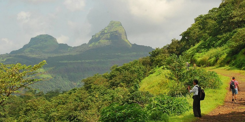 Rajmachi Fort, a historical site and tourist attraction near Khandi Waterfall.