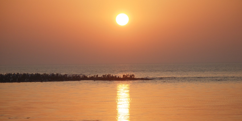 Rajodi Beach, the best place to visit in Vasai for couples to enjoy tranquil sunsets.
