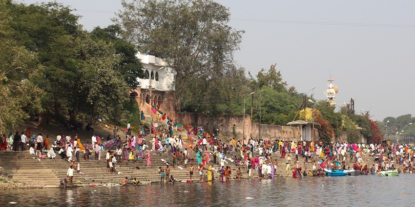 A scenic view of Ram Ghat in Ujjain, flooded with thousands of devotees.