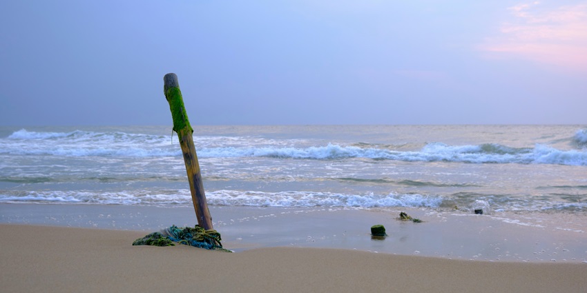 A srene shore of a beach with the waves coming, similar to Rangaon Beach