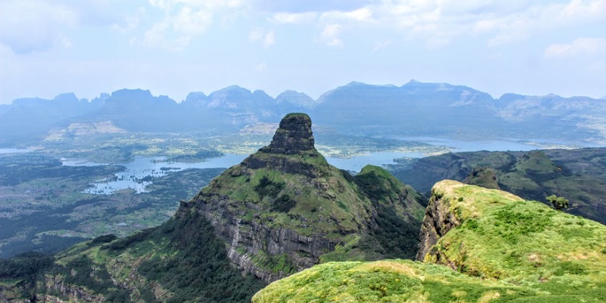 An image of the rugged landscape of Ratangad Fort with stunning panoramic views.