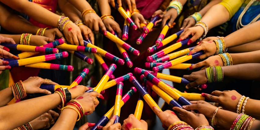 An image of Ratri before Navratri music festival with crowds dancing to Garba and modern beats.