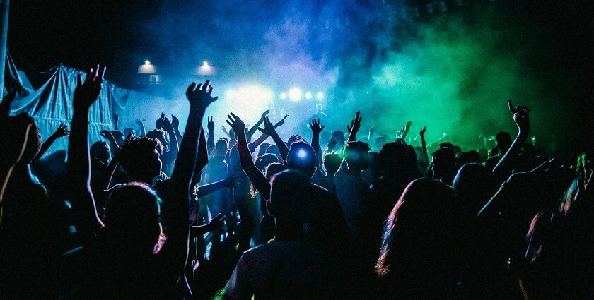 People enjoying the trance music at a rave party in Kasol