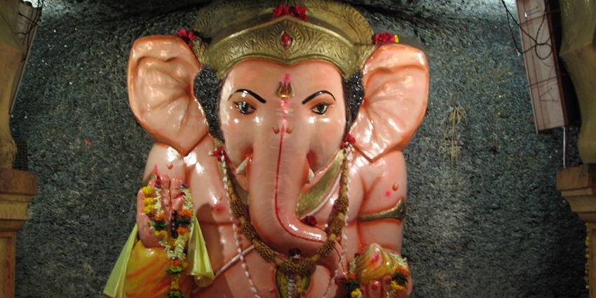Redi Ganpati Temple, dedicated to Lord Ganesha, provides a serene, green retreat.