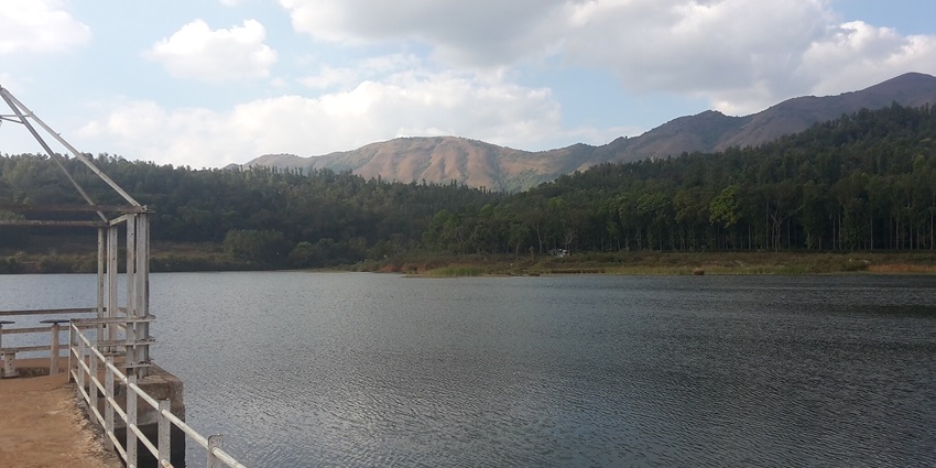 Hirekolale Lake features serene waters, stunning reflections, and natural beauty.