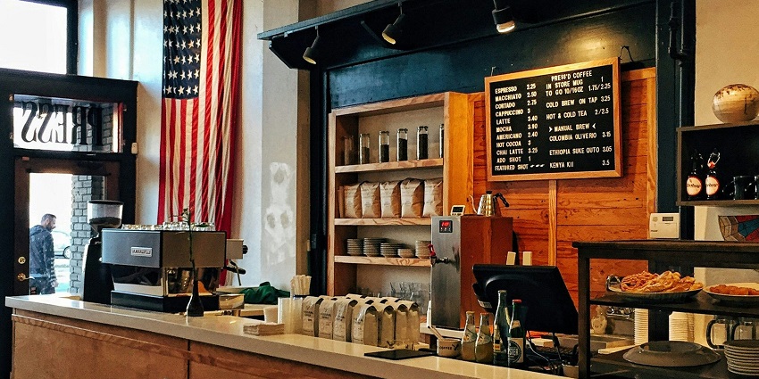 An inside view of a famous cafe adorned with rustic details and beautiful aesthetics.