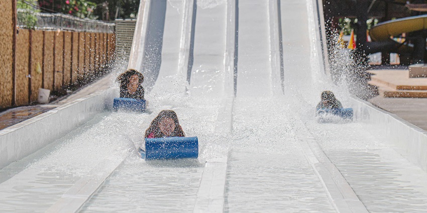 Enjoy fun rides like the Zip Zap Zoom slide and Tunnel slide at this water park