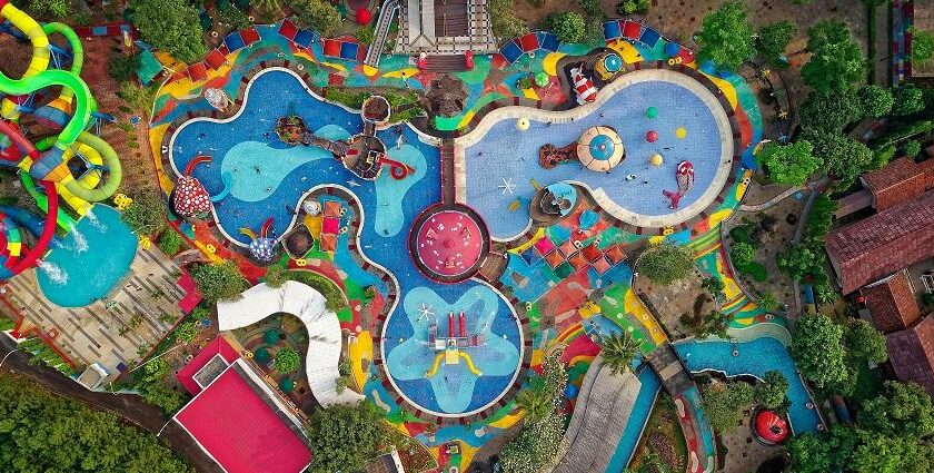 An aerial view of a Royal Water Park with colourful pools and slides in Vasai, Mumbai.