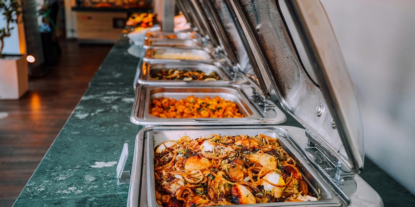 A glimpse of a delicious food buffet at the SWIG Bar and Eatery, a vibrant hotspot.