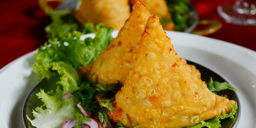The best street food in pondicherry is golden-brown samosas filled with spiced potatoes.