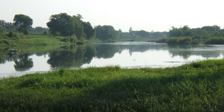 Elegant view of kaveri river in Sangama streaming though verdant landscapes