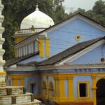 Saptakoteshwar Temple in Goa, reflecting its rich history and serene location.