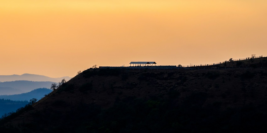 Breathtaking sunset over Saputara Hill Station, painting the sky with vibrant hues.