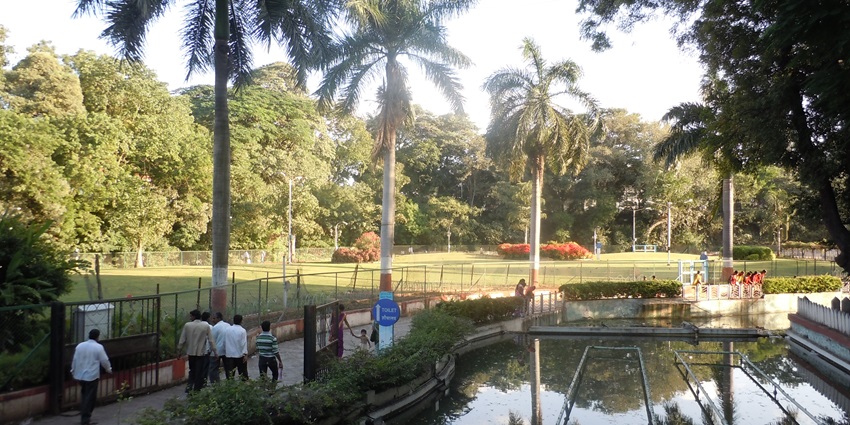 A lush green park with a revered Ganesh temple, perfect for relaxation and family outings.
