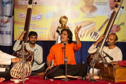 An image of a vibrant classic performance at the Sawai Gandharva Music Festival in Pune.